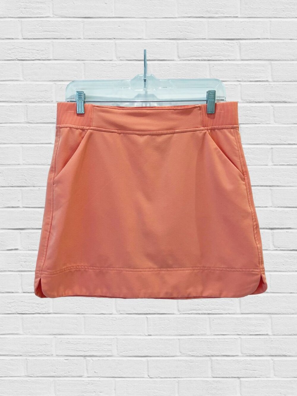 coral skort with deep side pockets